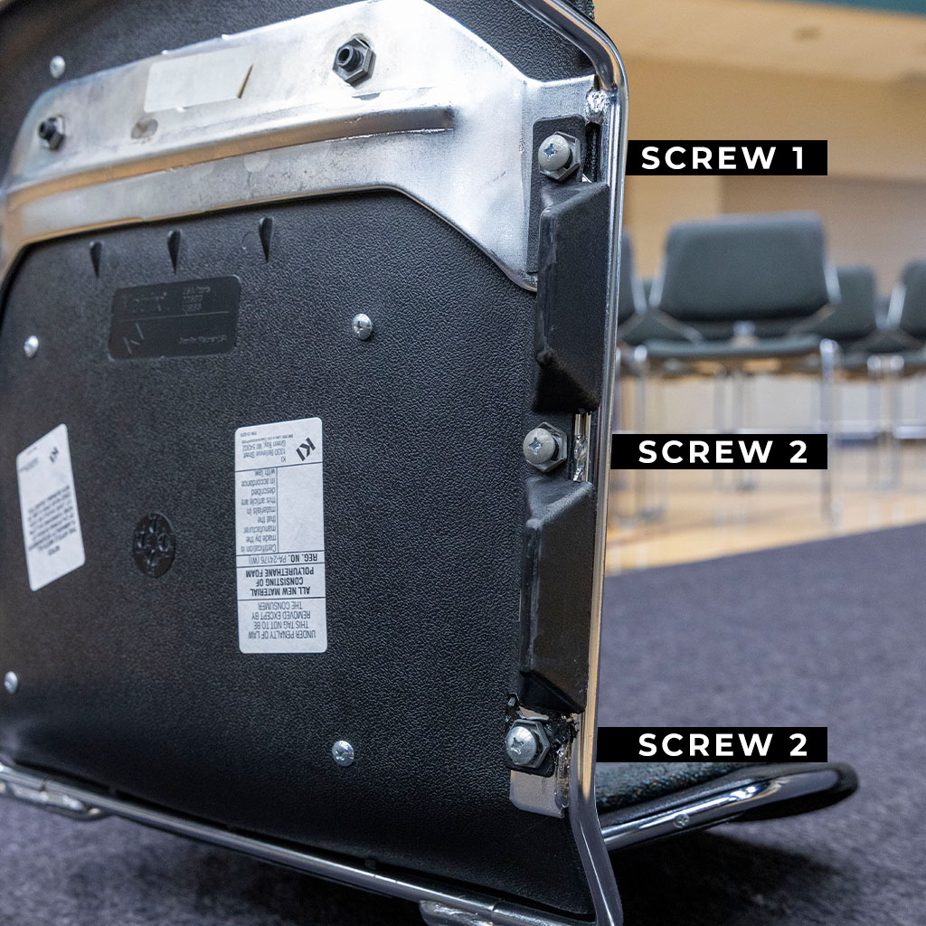 Underside of a Matrix KI chair showing the connector and three mounting screws
